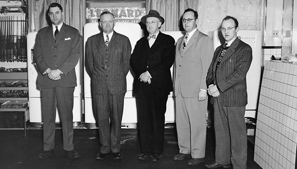 Visiting the Cleghorn store in Fitchburg, MA in 1947 from left to right are J. Paul Aubuchon, oldest son of John B. Aubuchon (who is standing next to him), William E. Aubuchon Sr. with his oldest son, William E. Aubuchon Jr., to his left and Peter J. Aubuchon Sr., the third son of William E. Aubuchon Sr.