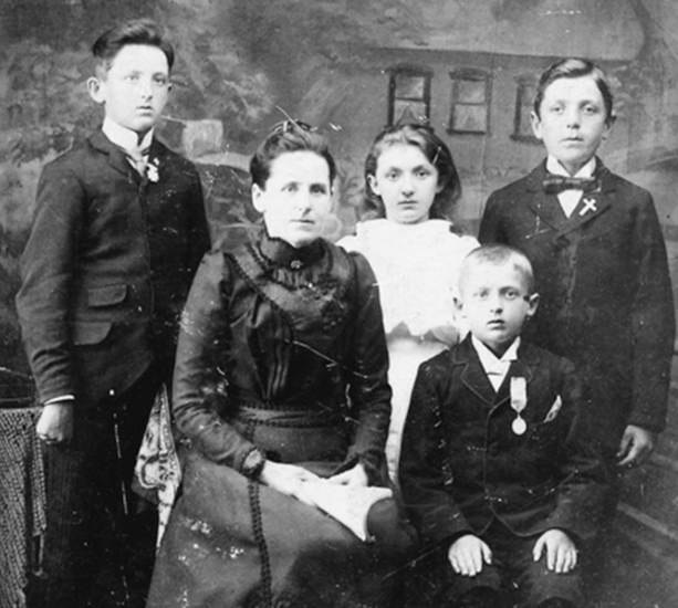 The widowed Georgiana L'Abbe Aubuchon sold the farm and moved her family to America on the Rutland Railroad in 1900. Prictured from left to right are William e., Georgiana, Albanie Marie, John B. and Arthur Joseph.