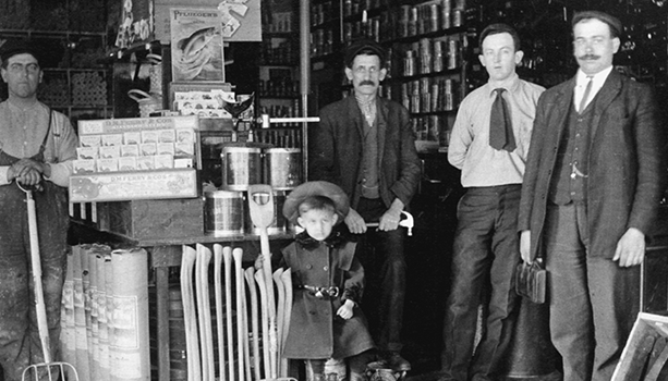 This is the oldest know photograph of an KEY M CORP store. It was taken in 1909 at 112 Fairmont Street in Fitchburg. Shown left to right are Alfred Boucher, Phileas Quintal and his son, William E. Aubuchon Sr. and Gonzague Marien.